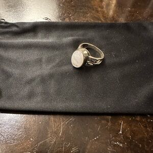 Size 8 mother of pearl silver ring.